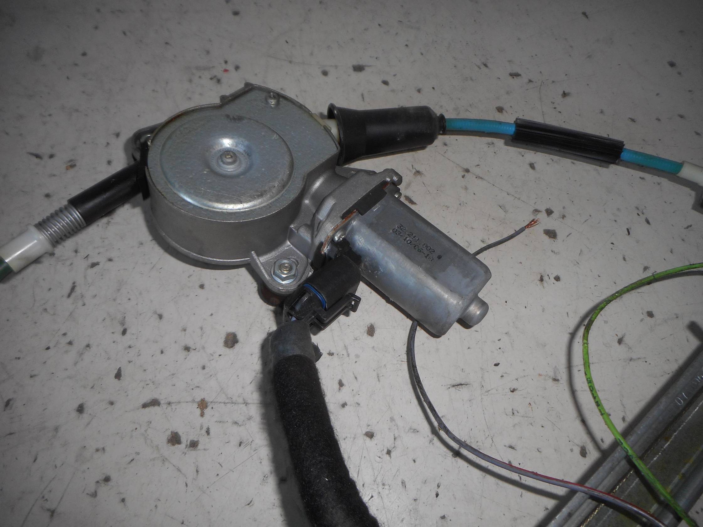 Alzacristallo elettr. porta post. sx.